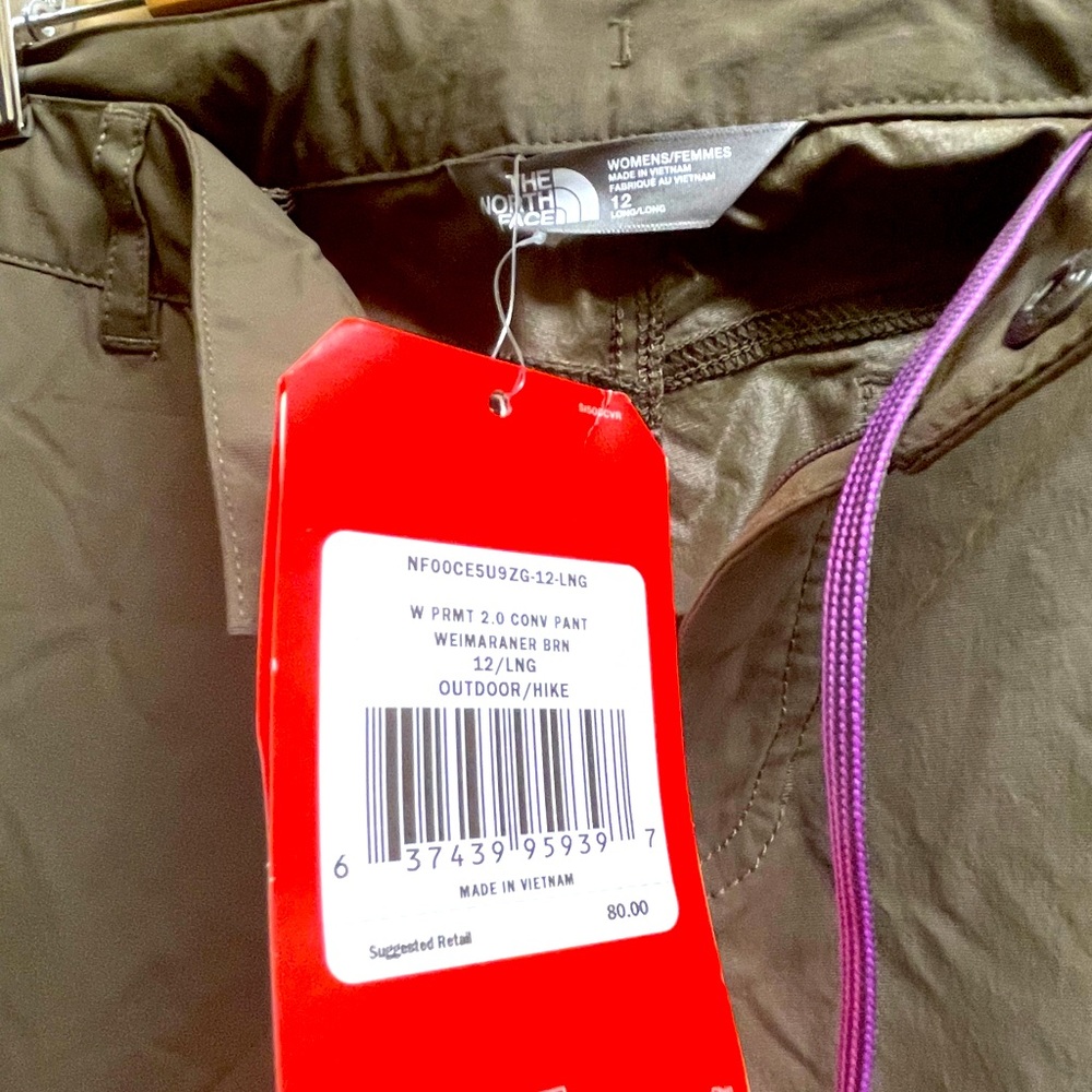 North face hiking pants w/ zipped legs. NWT